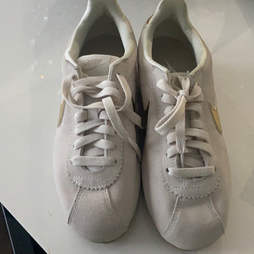Cream and gold Nike